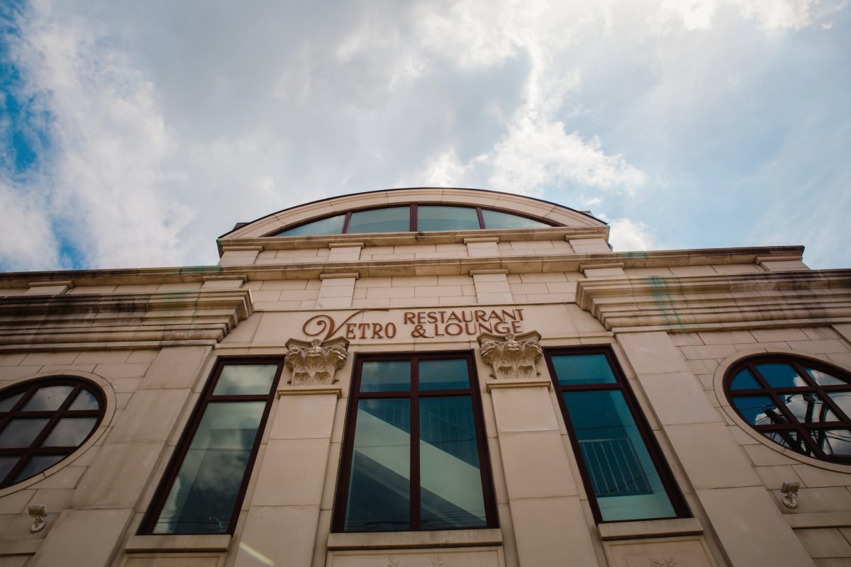 The Vetro Restaurant & Lounge facade under a blue sky