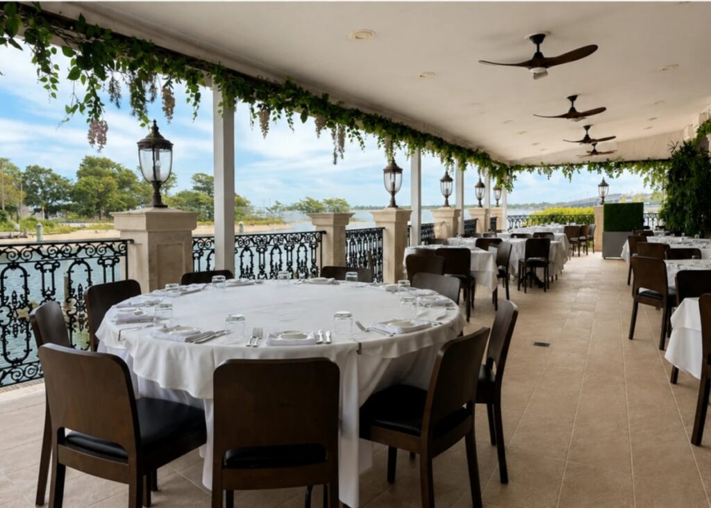 Outdoor tables on Vetro’s waterfront veranda